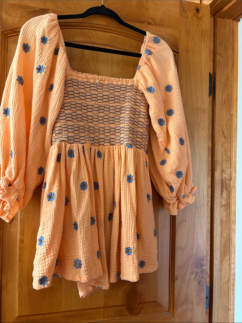 Women’s Peach Smocked Bodice Romper with Blue Floral Embroidery